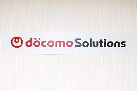 Docomo Solutions signboard and logo